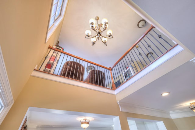 details with a chandelier and crown molding