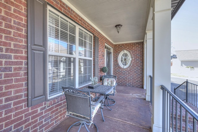 view of patio featuring a porch