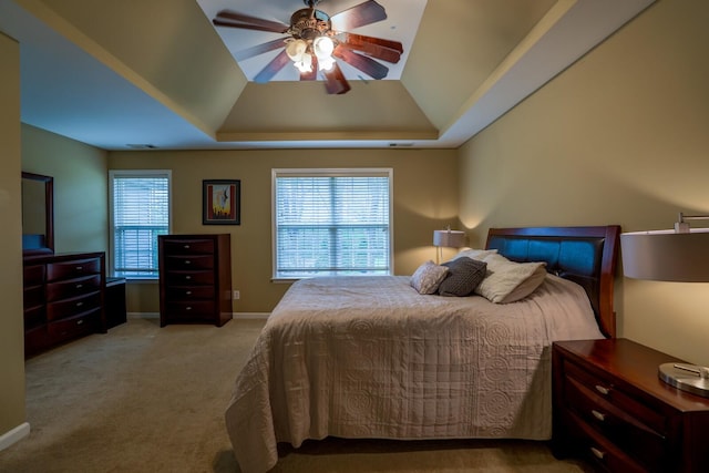 1128 Carriage Park Dr, Franklin, TN 37064 - bedroom with a tray ceiling, a ceiling fan, visible vents, carpet floors, and baseboards