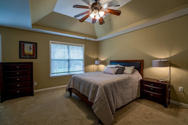 1128 Carriage Park Dr, Franklin, TN 37064 - bedroom featuring baseboards, a raised ceiling, ceiling fan, and light carpet
