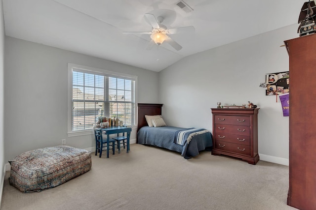 carpeted bedroom featuring ceiling fan, baseboards, visible vents, and vaulted ceiling