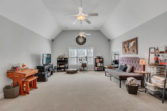 interior space with lofted ceiling, carpet floors, and ceiling fan