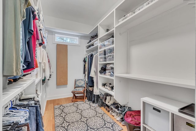 spacious closet with light wood-style floors