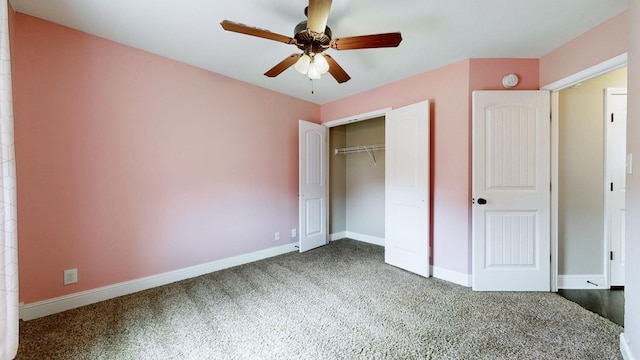 unfurnished bedroom featuring carpet floors, ceiling fan, baseboards, and a closet