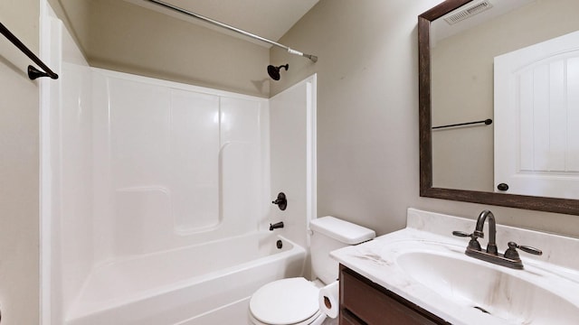 bathroom with visible vents, vanity, toilet, and tub / shower combination