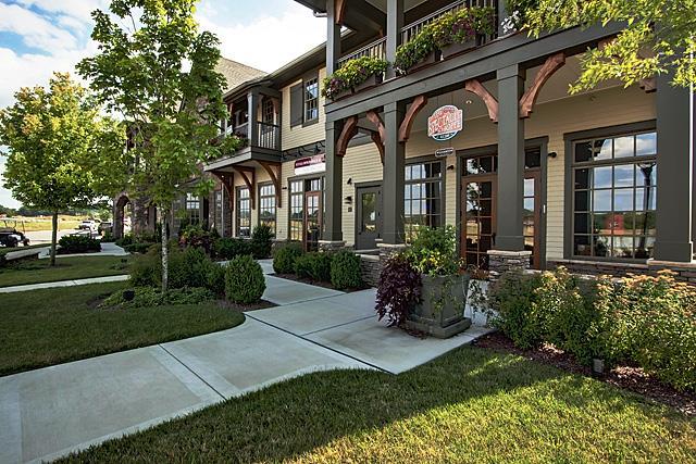 property entrance with a yard