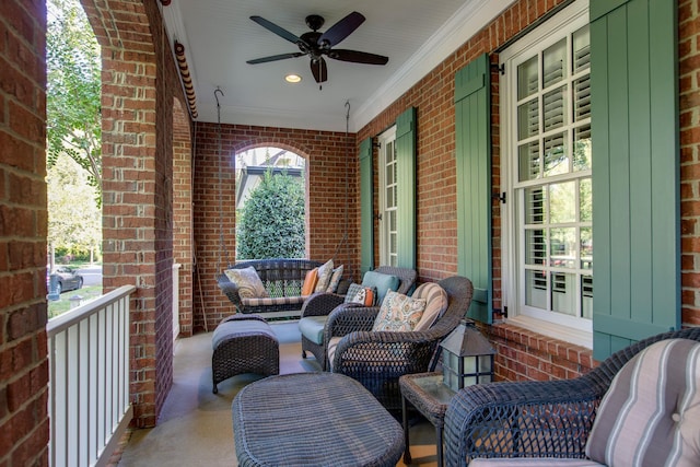 view of patio / terrace featuring a ceiling fan and covered porch