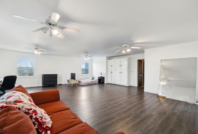 living area with baseboards and dark wood-style flooring