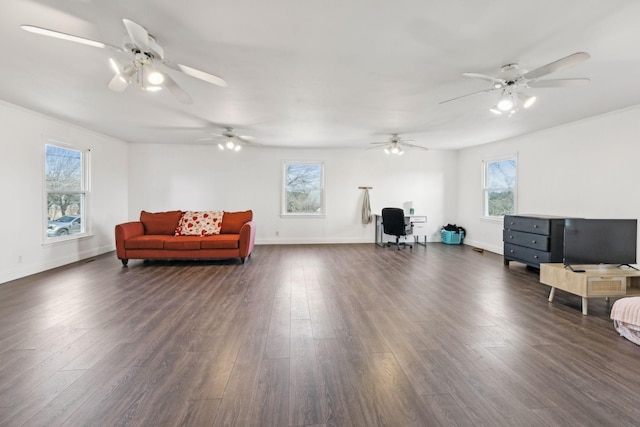 living room with baseboards and dark wood-style flooring