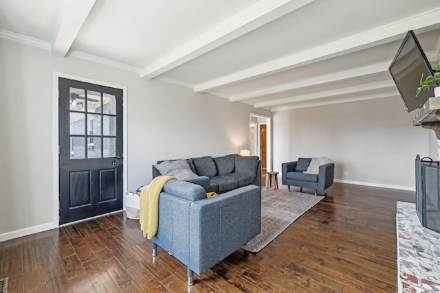 living room featuring a fireplace, beam ceiling, wood finished floors, and baseboards