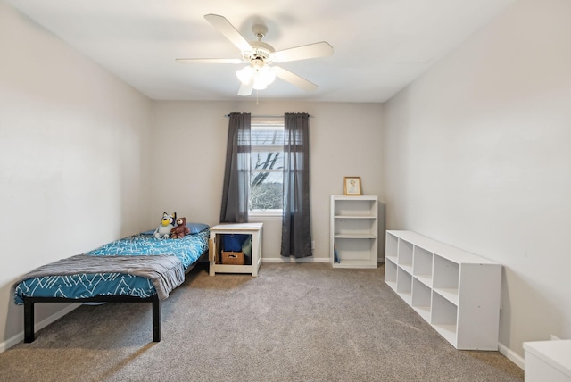 bedroom featuring carpet flooring, ceiling fan, and baseboards