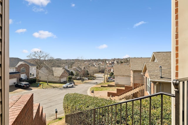 balcony featuring a residential view