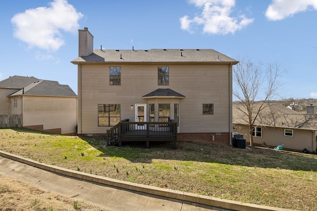 rear view of property with a deck, central AC, a yard, crawl space, and a chimney