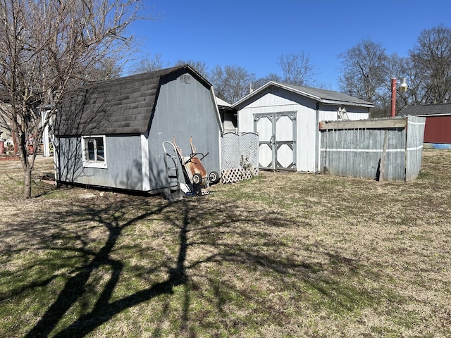 view of yard with a shed and an outdoor structure