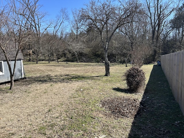 view of yard featuring fence