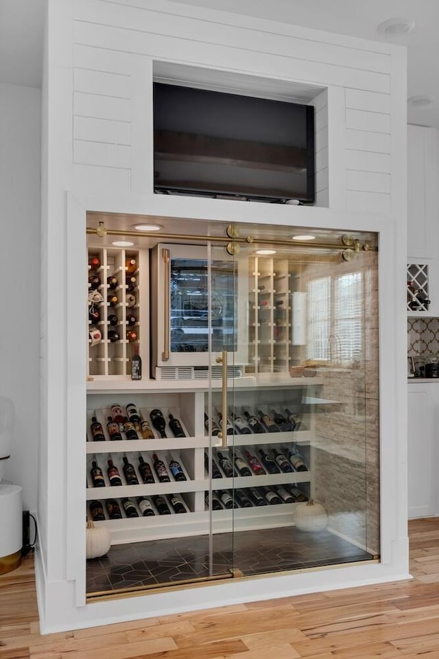 wine room featuring wood finished floors