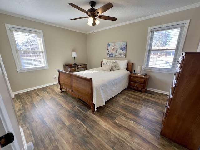 bedroom with baseboards, dark wood-style flooring, and crown molding