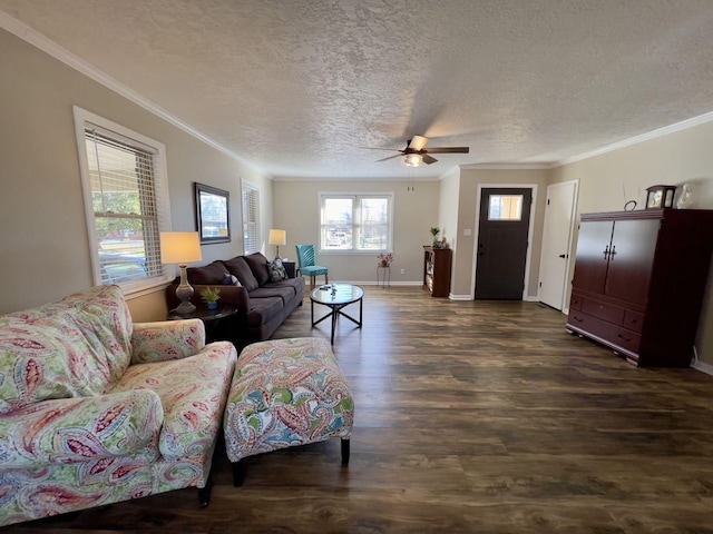 living room with crown molding, dark wood-type flooring, a ceiling fan, a textured ceiling, and baseboards