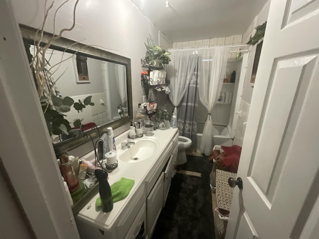 full bath with vanity and toilet