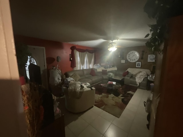 tiled living room featuring a ceiling fan