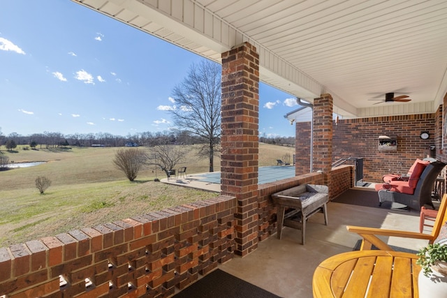 view of patio / terrace with a ceiling fan