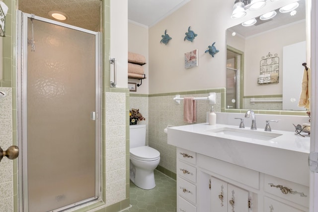 bathroom with toilet, a stall shower, and ornamental molding