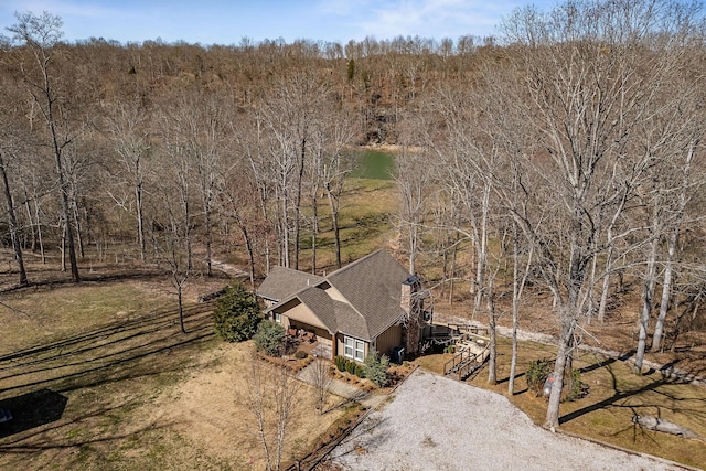 bird's eye view with a view of trees