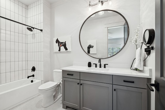 full bathroom featuring toilet, tile patterned floors, tub / shower combination, and vanity