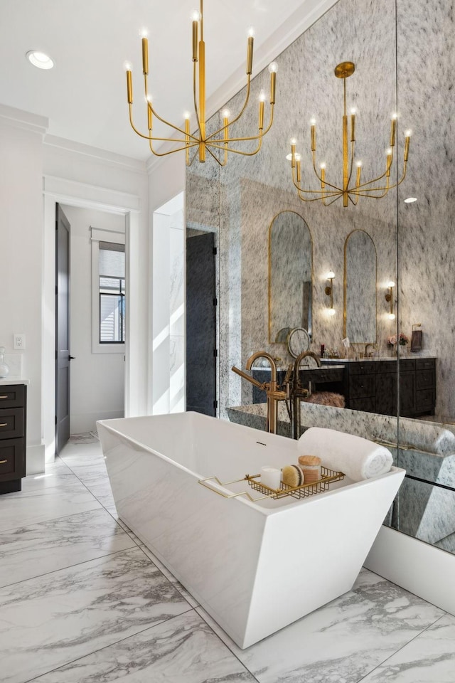 full bath with marble finish floor, a soaking tub, vanity, and a towering ceiling