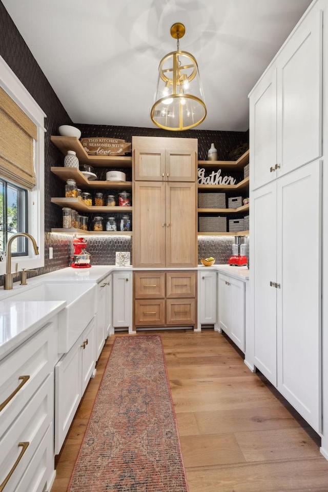 storage area featuring a sink