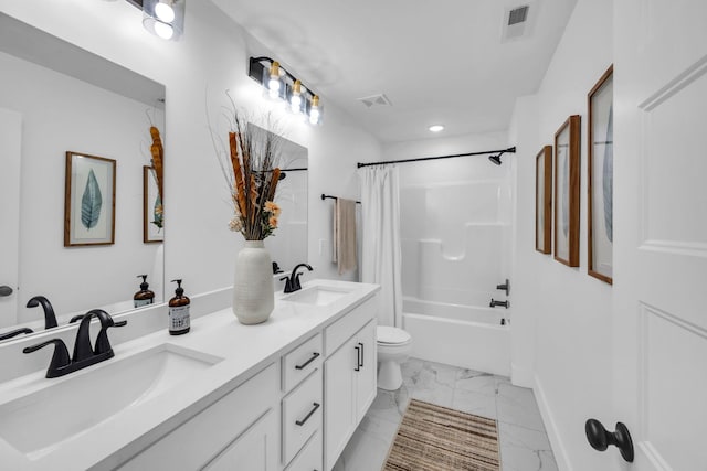 full bath featuring marble finish floor, visible vents, a sink, and double vanity