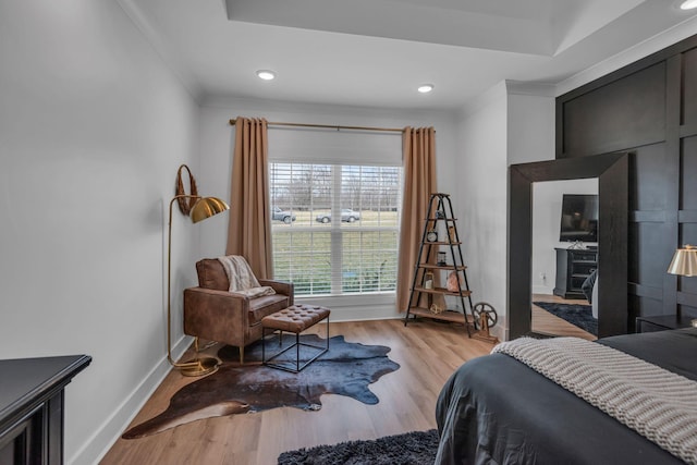 bedroom with recessed lighting, baseboards, and wood finished floors