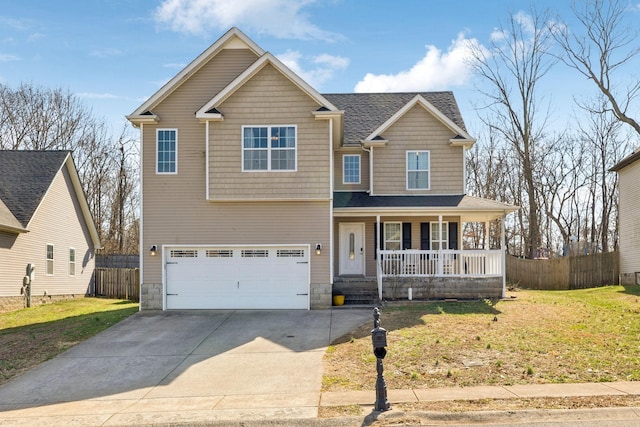 view of front of home featuring covered porch, a garage, fence, driveway, and a front yard