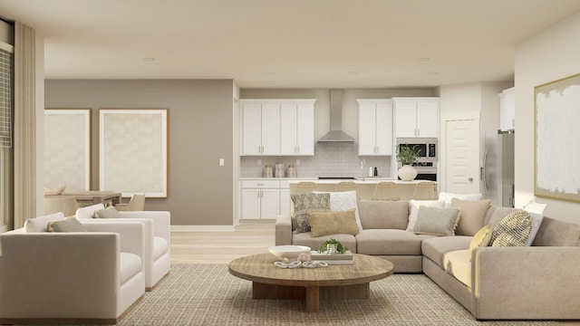 living area featuring light wood-type flooring and baseboards