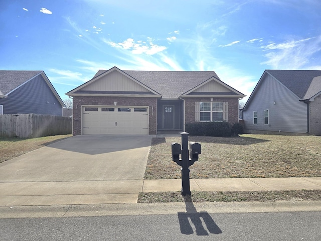 view of front of property featuring a garage, concrete driveway, brick siding, and fence