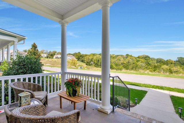 balcony featuring covered porch