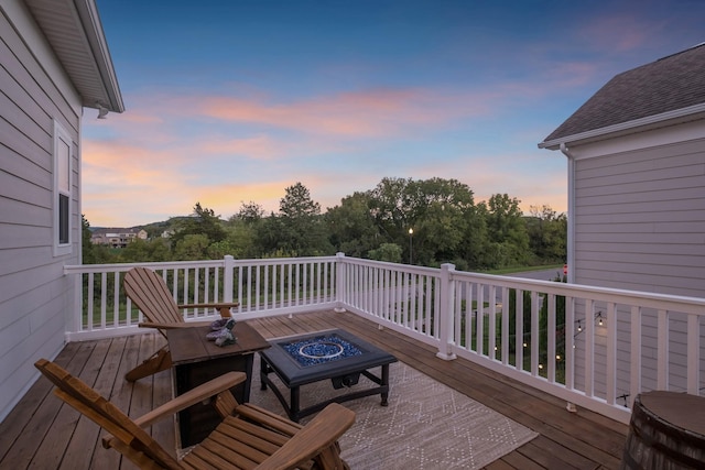 deck with an outdoor fire pit