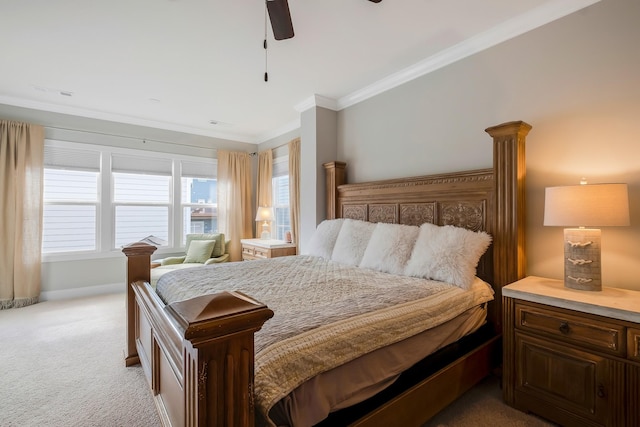 bedroom with ornamental molding, light colored carpet, ceiling fan, and baseboards