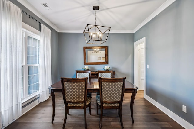 dining space with ornamental molding, plenty of natural light, dark wood finished floors, and baseboards