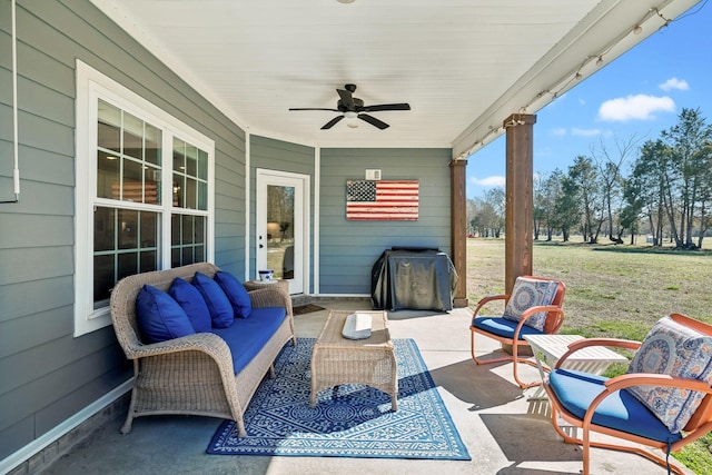 view of patio / terrace featuring ceiling fan and outdoor lounge area