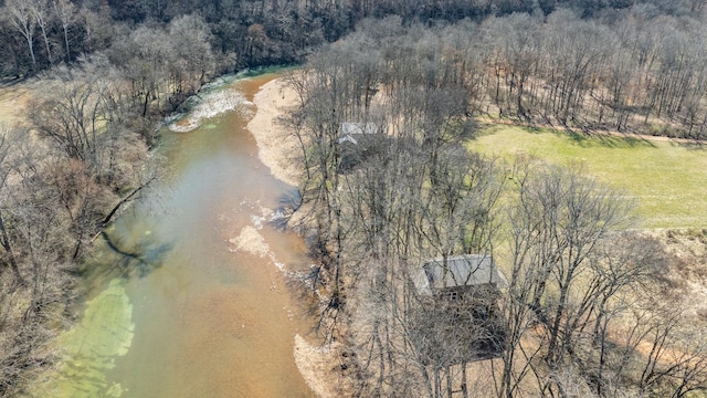 bird's eye view featuring a forest view