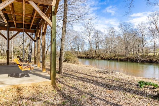 exterior space with a water view