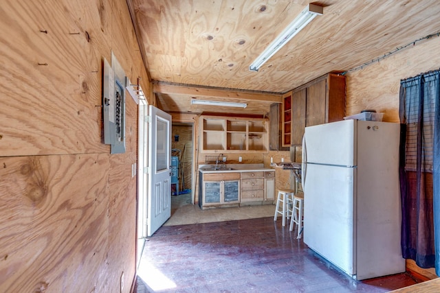 kitchen with freestanding refrigerator, wood ceiling, electric panel, and open shelves