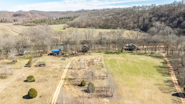 birds eye view of property with a rural view