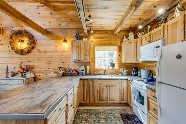 kitchen with wooden ceiling, white appliances, beamed ceiling, and light brown cabinetry