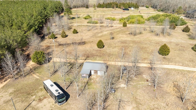 birds eye view of property with a rural view