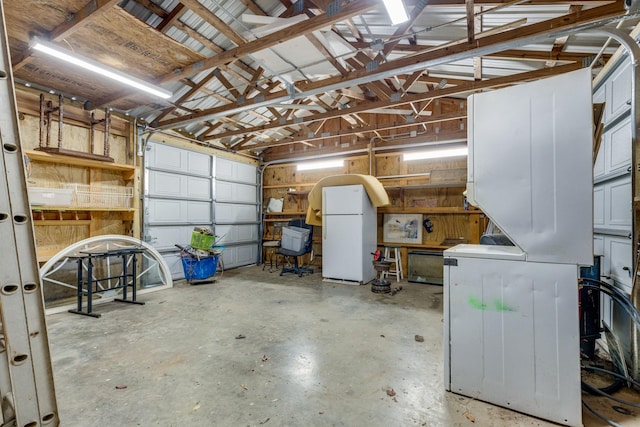 garage with freestanding refrigerator