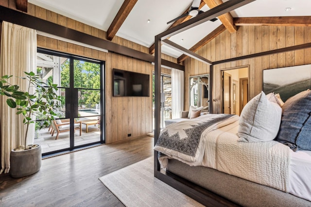 bedroom with vaulted ceiling with beams, wood walls, access to outside, and wood finished floors