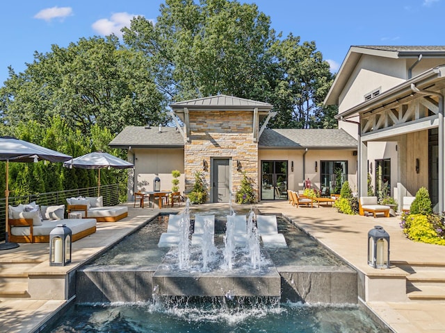 exterior space featuring an outdoor living space and a patio