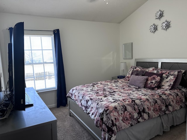 bedroom with light carpet and baseboards